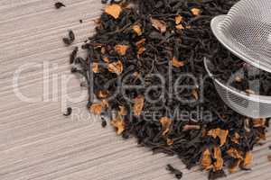 Black dry tea with petals