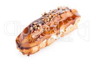 Eclair with caramel decoration