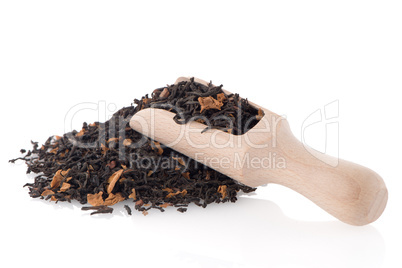 Black Dry Tea with a Wooden Spoon