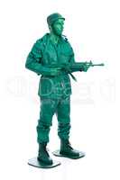 Man on a green toy soldier costume