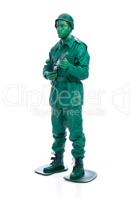 Man on a green toy soldier costume