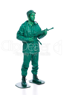 Man on a green toy soldier costume