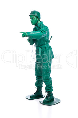 Man on a green toy soldier costume