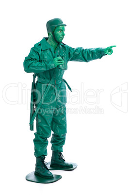 Man on a green toy soldier costume