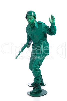 Man on a green toy soldier costume