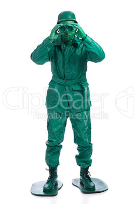 Man on a green toy soldier costume