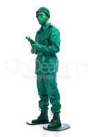 Man on a green toy soldier costume