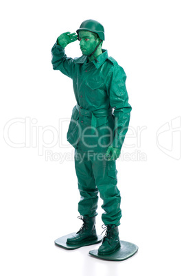 Man on a green toy soldier costume