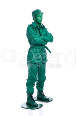 Man on a green toy soldier costume