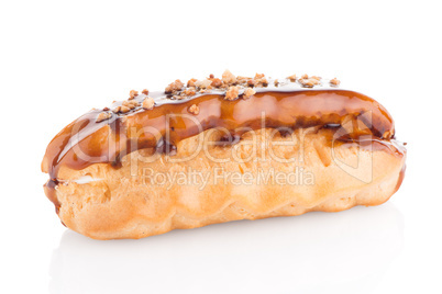 Eclair with caramel decoration