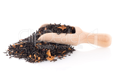 Black Dry Tea with a Wooden Spoon