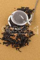 Black dry tea with petals