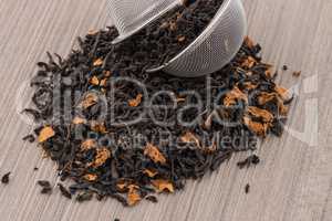 Black dry tea with petals