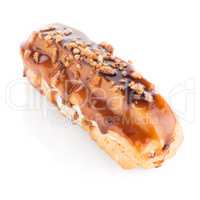 Eclair with caramel decoration