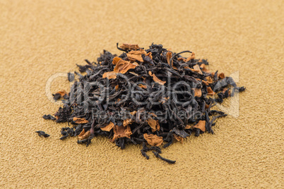 Black dry tea with petals