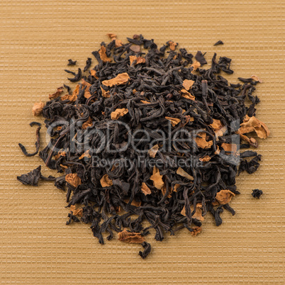 Black dry tea with petals