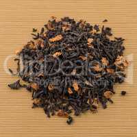 Black dry tea with petals