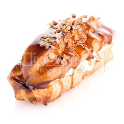 Eclair with caramel decoration