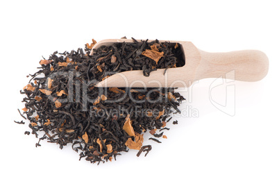 Black Dry Tea with a Wooden Spoon