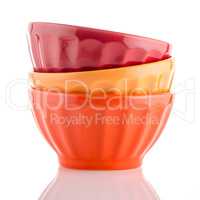 Three colored bowls