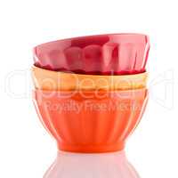 Three colored bowls