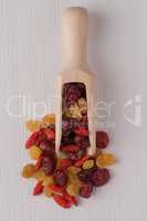 Wooden scoop with mixed dried fruits