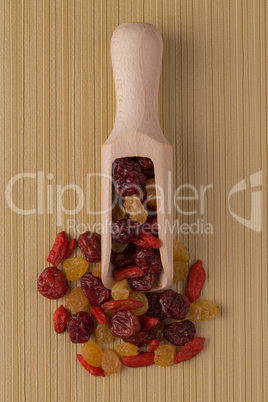 Wooden scoop with mixed dried fruits