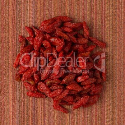 Circle of dry red goji berries