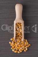 Wooden scoop with corn