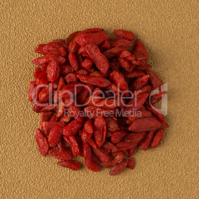 Circle of dry red goji berries