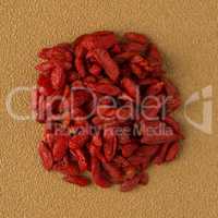 Circle of dry red goji berries