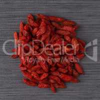 Circle of dry red goji berries