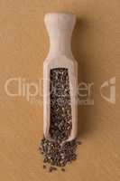 Wooden scoop with chia seeds