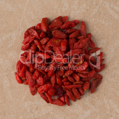 Circle of dry red goji berries