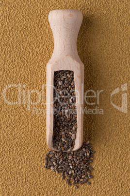 Wooden scoop with chia seeds