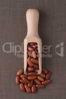 Wooden scoop with red beans