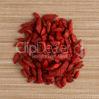 Circle of dry red goji berries