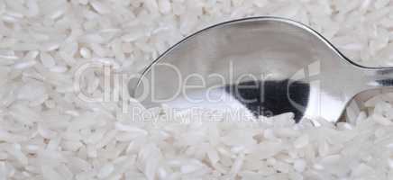 rice background and teaspoon