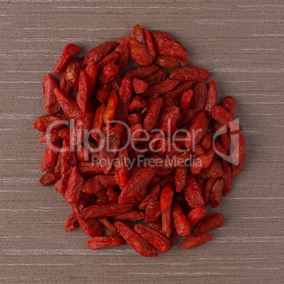 Circle of dry red goji berries