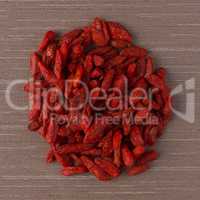 Circle of dry red goji berries