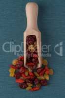 Wooden scoop with mixed dried fruits