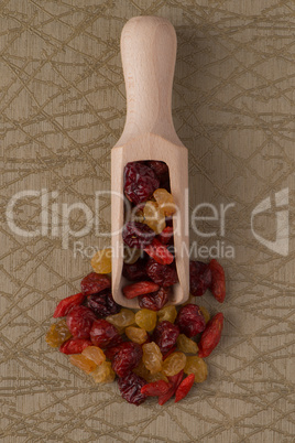 Wooden scoop with mixed dried fruits