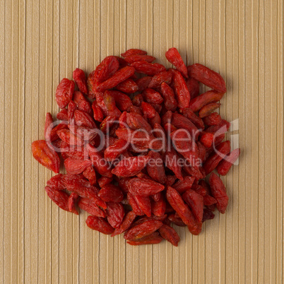 Circle of dry red goji berries