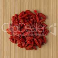 Circle of dry red goji berries