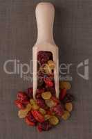 Wooden scoop with mixed dried fruits