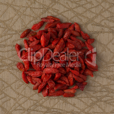 Circle of dry red goji berries