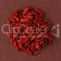 Circle of dry red goji berries