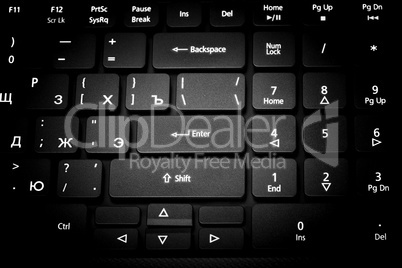 Electronic collection - laptop keyboard. The focus on the Enter