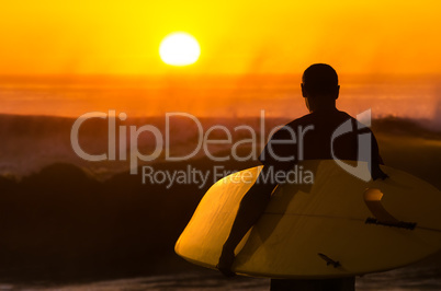 Surfer watching the waves