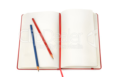 notepad and pencils isolated on white background